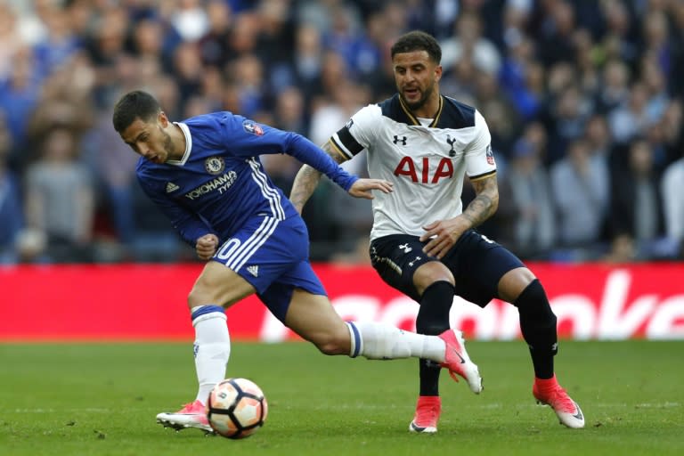 Chelsea's Eden Hazard (L) fights for the ball with Tottenham Hotspur's Kyle Walker during their FA Cup semi-final match, at Wembley stadium in London, on April 22, 2017