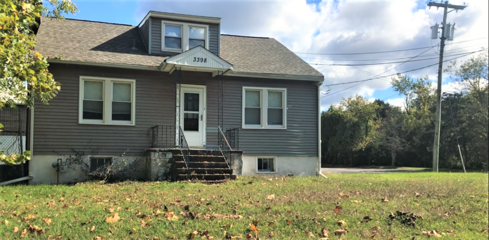 This house at 3398 South Black Horse Pike is in front of the International Process Plants Williamstown Yard. About 60 acres including the yard is up for sale for use by Copart of Connecticut Inc. of Dallas Texas for a wrecked vehicle 'salvage pool.' The Monroe Township Zoning Board must approve the proposal. The board is to have a hearing on Oct. 19. PHOTO: Oct. 17, 2023.