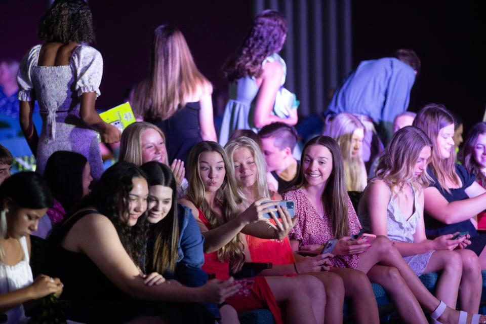 Student athletes take their seats for the 2022 Northeast Kansas High School Sports Awards at the Topeka Performing Arts Center on Tuesday.