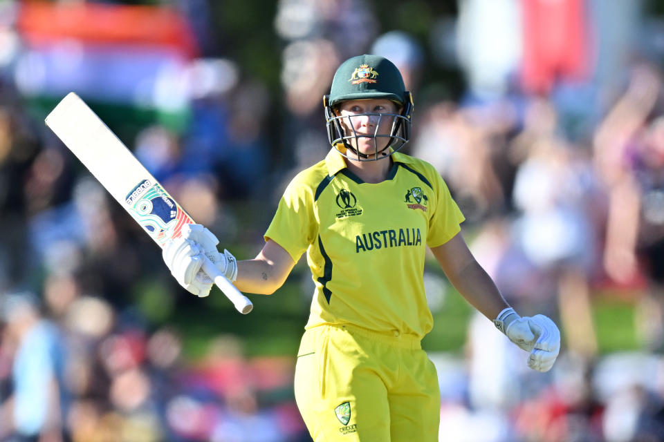 Seen here, Australia's Alyssa Healy raises her bat after scoring a huge century in the Women's World Cup final against England.