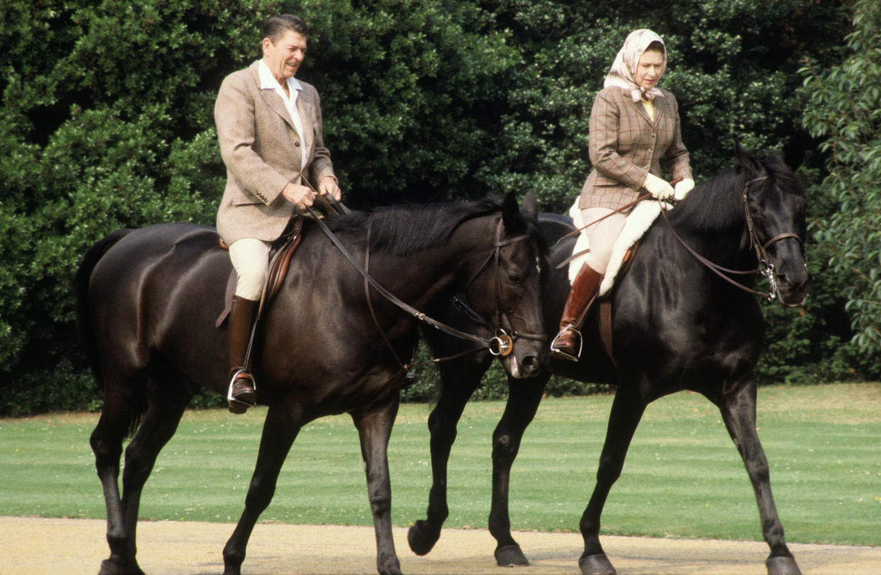 Queen Elizabeth II and President Ronald Reagan riding through the grounds of Windsor Castle (David Levenson / Getty Images)