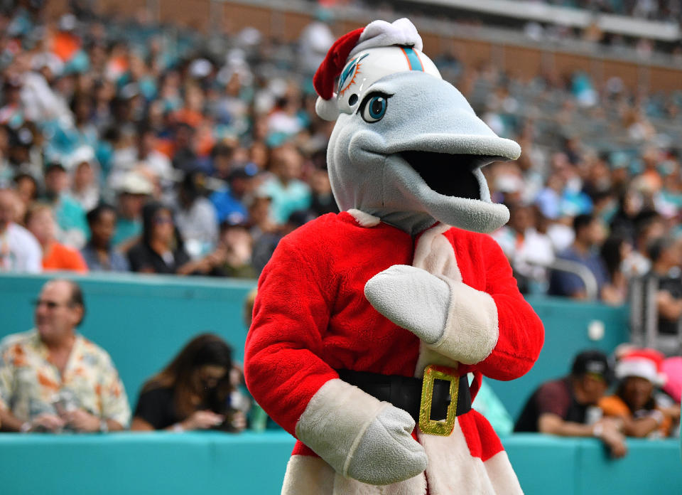 MIAMI, FLORIDA - DECEMBER 22: The Miami Dolphins mascot performs as Santa Clause during the game against the Cincinnati Bengals in the first quarter at Hard Rock Stadium on December 22, 2019 in Miami, Florida. (Photo by Mark Brown/Getty Images)
