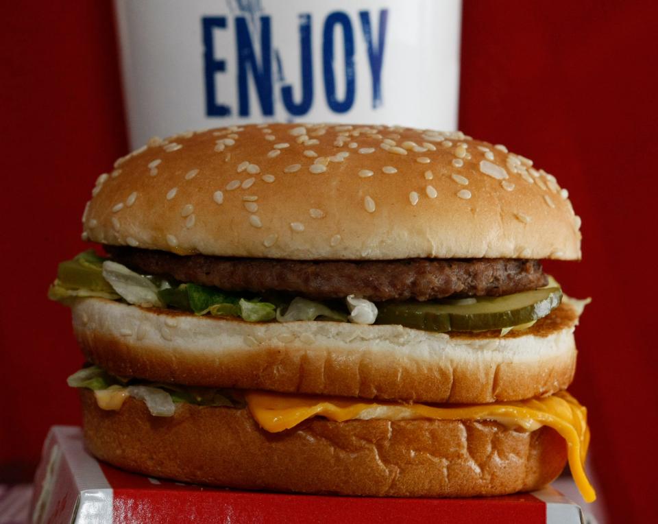 A Big Mac sandwich in front of a drink at McDonald's in North Huntingdon, Pa on Dec. 29, 2009.