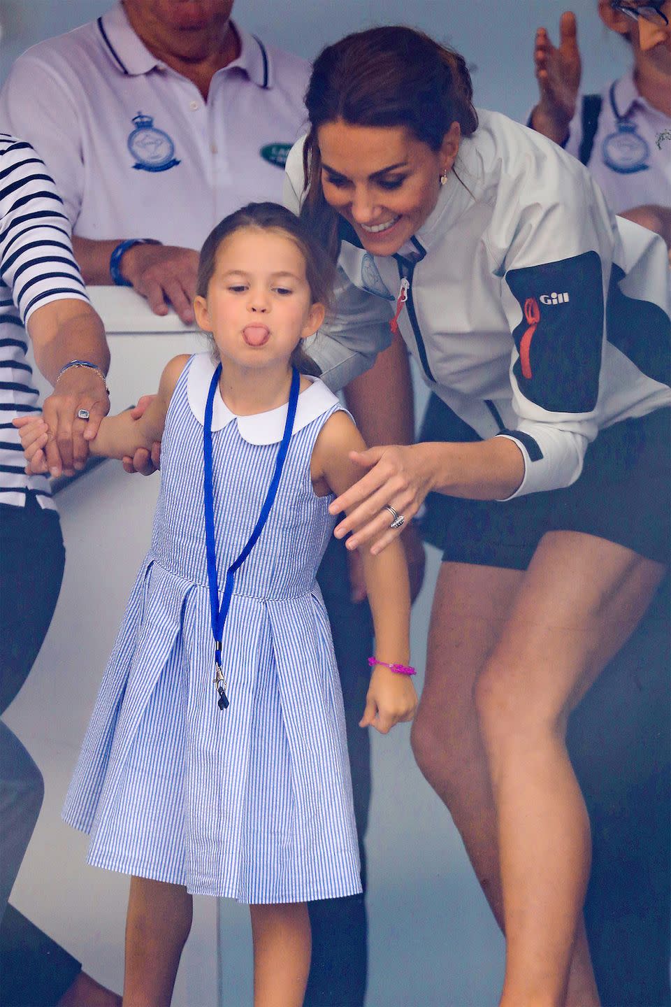 <p>The duchess laughs as Princess Charlotte sticks her tongue out at onlookers at the King's Cup Regatta.</p>