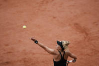 France's Leolla Jeanjean serves against Karolina Pliskova of the Czech Republic during their second round match at the French Open tennis tournament in Roland Garros stadium in Paris, France, Thursday, May 26, 2022. (AP Photo/Thibault Camus)