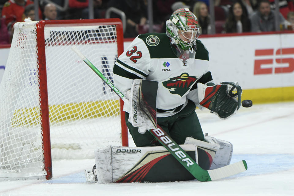 Minnesota Wild goalie Filip Gustavsson makes a save during the first period of an NHL hockey game against the Chicago Blackhawks, Monday, April 10, 2023. (AP Photo/Paul Beaty)