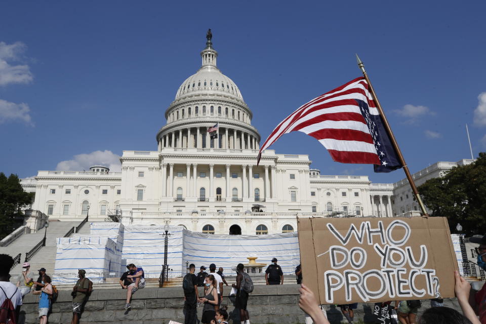 Demonstrators protest Thursday, June 4, 2020, on the West Front of the U.S. Capitol in Washington, over the death of George Floyd, a black man who was in police custody in Minneapolis. Floyd died after being restrained by Minneapolis police officers. (AP Photo/Alex Brandon)