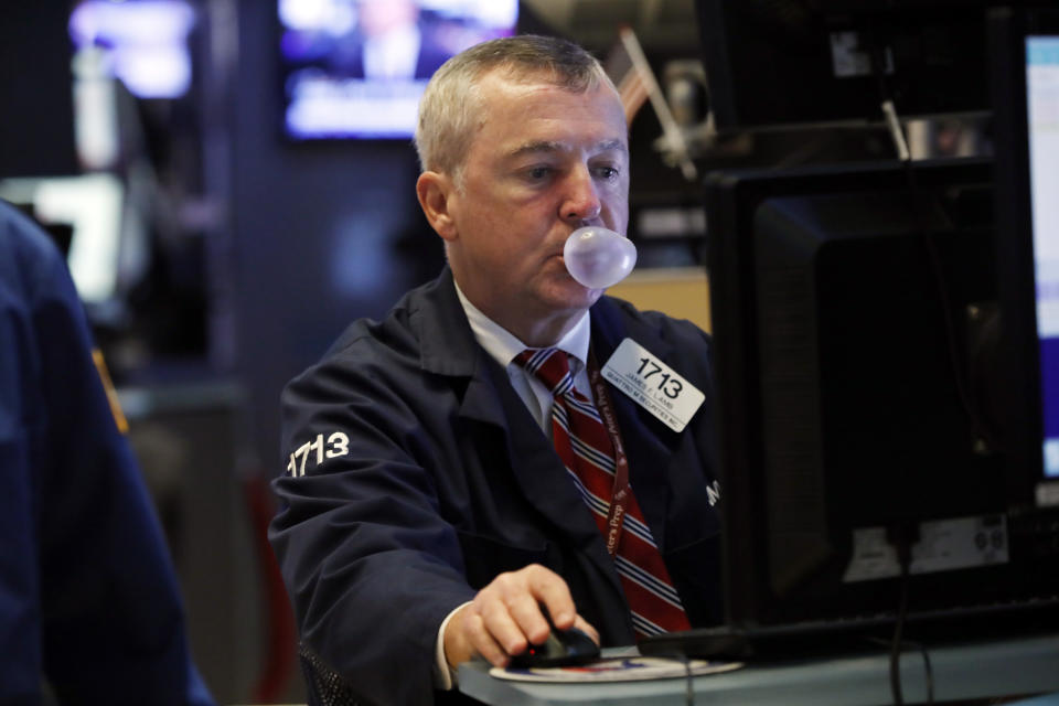 Trader James lamb works on the floor of the New York Stock Exchange, Tuesday, Oct. 8, 2019. Stocks are opening lower on Wall Street as tensions rose between Washington and Beijing just ahead of the latest round of trade talks. (AP Photo/Richard Drew)