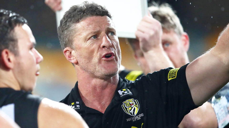 Pictured here, Richmond coach Damien Hardwick addressing his players.