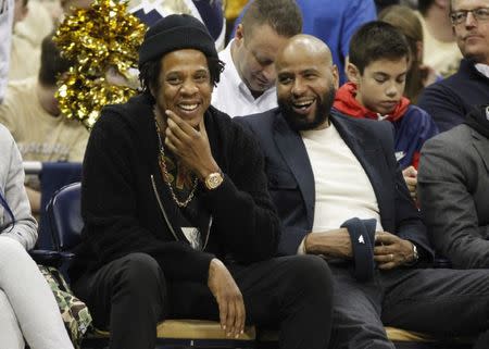 Jan 22, 2019; Pittsburgh, PA, USA; Recording artist Jay-Z (left) looks on as the Pittsburgh Panthers host the Duke Blue Devils at the Petersen Events Center. Duke won 79-64. Mandatory Credit: Charles LeClaire-USA TODAY Sports