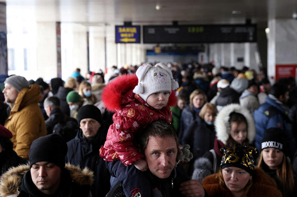 People wait to board an evacuation train from Kyiv to Lviv at Kyiv central train station following Russia's invasion of Ukraine, in Kyiv, Ukraine March 1, 2022. REUTERS/Umit Bektas