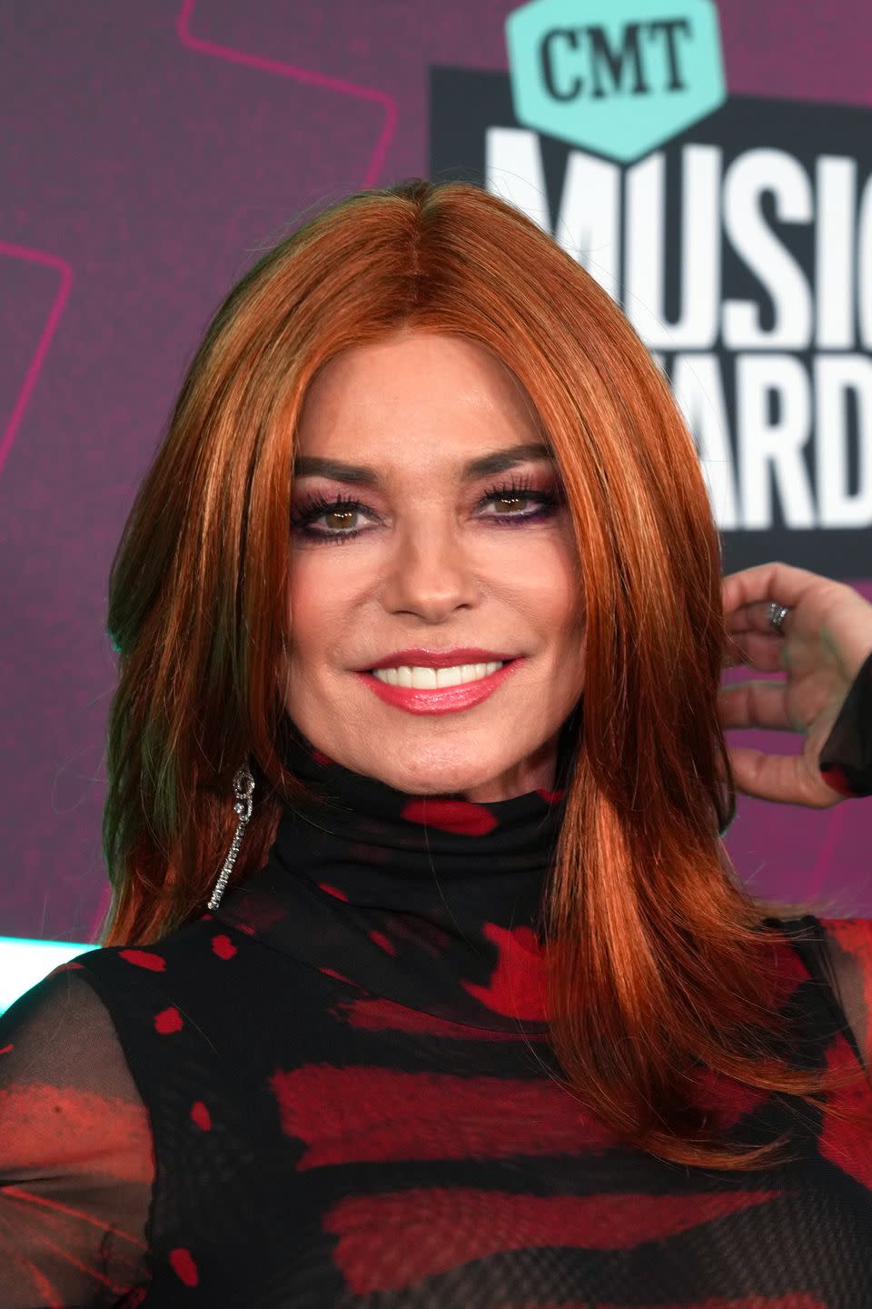 Shania Twain's new vibrant, fiery red hair colour is a head-turner