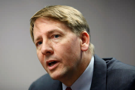 FILE PHOTO: Consumer Financial Protection Bureau (CFPB) Director Richard Cordray answers questions at the Reuters Washington Summit in Washington, DC, U.S. October 23, 2013. REUTERS/Jonathan Ernst/File Photo