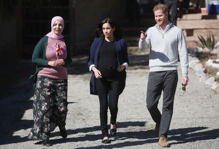 Britain's Prince Harry and Meghan, Duchess of Sussex, leave after a visit at a boarding house for girls run by the Moroccan NGO "Education for All" in Asni, Morocco, February 24, 2019. REUTERS/Hannah McKay
