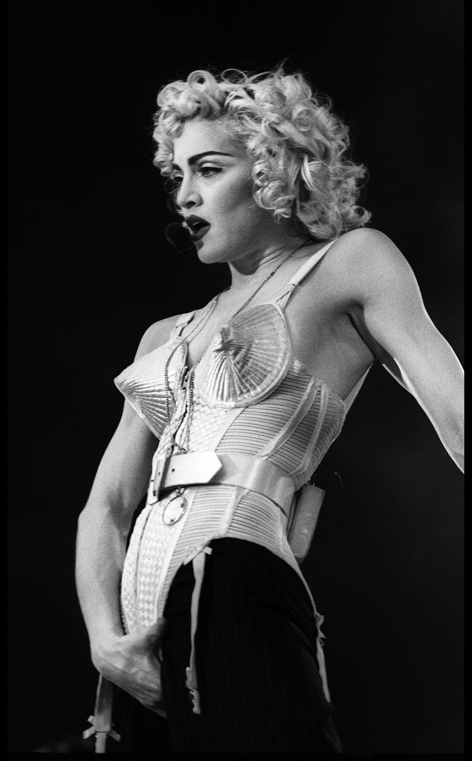 Madonna performs on stage at Feyenoord Stadium, de Kuip, Rotterdam, Netherlands on the Blond Ambition World Tour