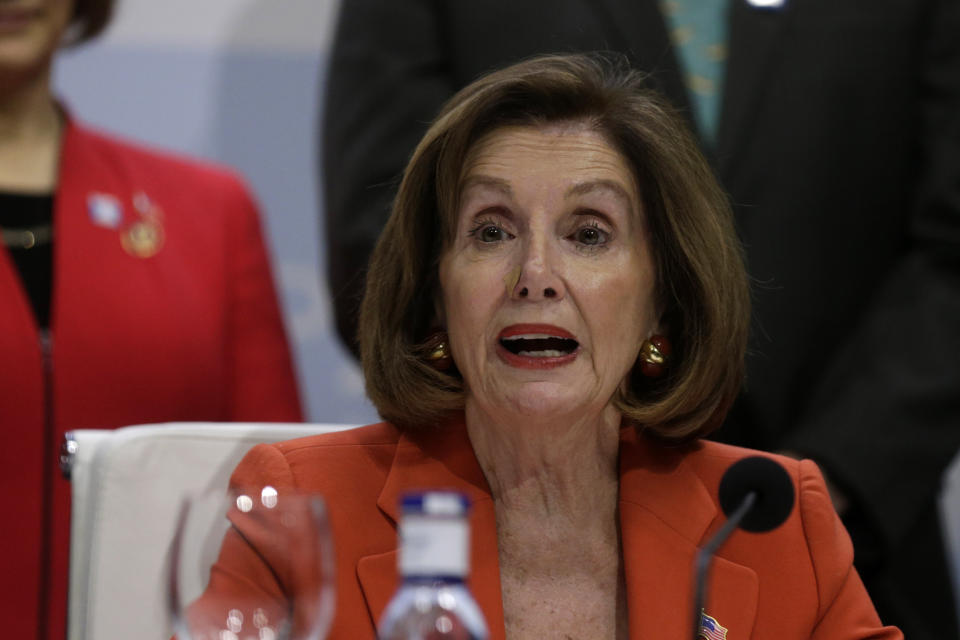 House Speaker Nancy Pelosi of Calif. speaks during a press conference at the COP25 climate talks summit in Madrid, Monday Dec. 2, 2019. The chair of a two-week climate summit attended by nearly 200 countries warned at its opening Monday that those refusing to adjust to the planet's rising temperatures "will be on the wrong side of history." (AP Photo/Andrea Comas)