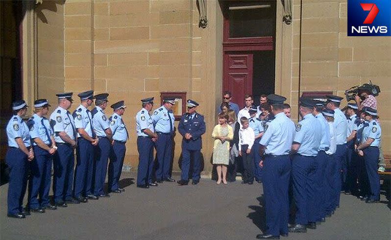 David Rixon's widow, Fiona Rixon, emerges from the Supreme Court to a guard of honour. Photo: 7News/Robert Ovadia.