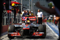 MONTREAL, CANADA - JUNE 10: Lewis Hamilton of Great Britain and McLaren waves the Union Jack flag in celebration as he drives down the pitlane after winning the Canadian Formula One Grand Prix at the Circuit Gilles Villeneuve on June 10, 2012 in Montreal, Canada. (Photo by Paul Gilham/Getty Images)