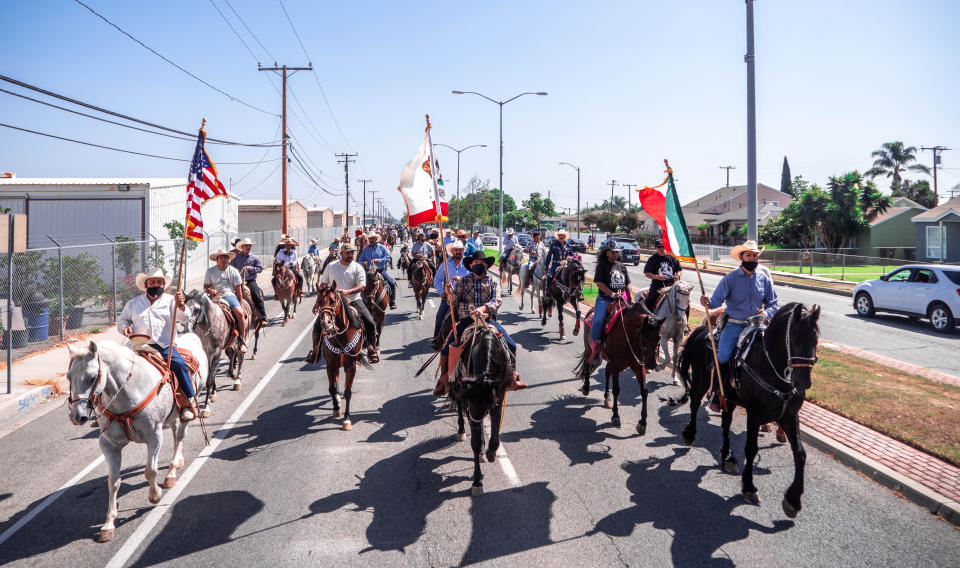 Approximately 200 vaqueros ride through the streets of Compton on Sept. 20, 2020. (Connecting Compton)