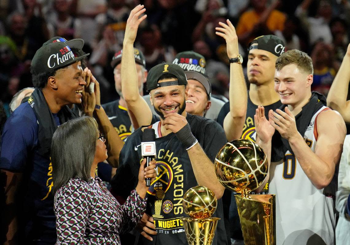 Denver Nuggets guard Jamal Murray, center, chokes up while being interviewed after his team won the NBA championship on June 12. He&#x002019;s the second John Calipari-coached player to win an NBA title.