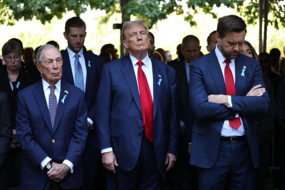 The former president gazed up at the sky as others bowed their heads at Ground Zero (Getty Images)