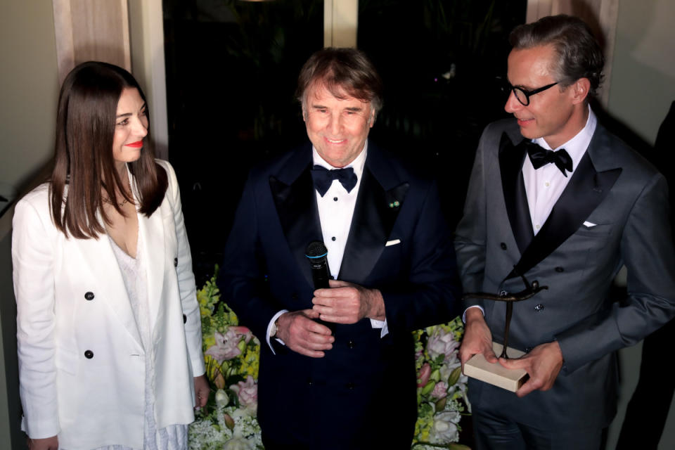 Cucinelli, with Lana Todorovich and Geoffroy van Raemdonck, at a cocktail celebrating the Neiman Marcus Group Awards during Paris Fashion Week in March 2023. The designer received the Neiman Marcus Award for Distinguished Service in the Field of Fashion.<p>Photo: François Goizé/WWD via Getty Images</p>