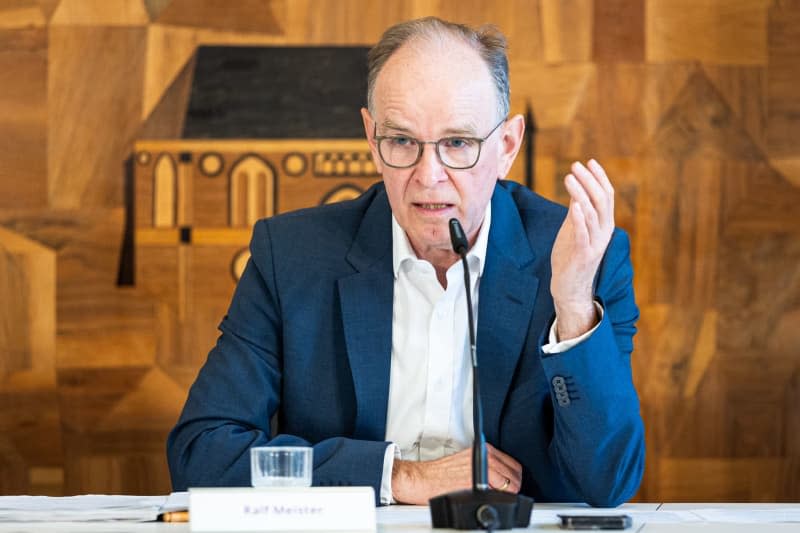 Ralf Meister, Bishop of the Evangelical Lutheran Church in Hanover, speaks during a press conference on an independent report on sexualized violence in the Protestant parish of Oesede. Moritz Frankenberg/dpa