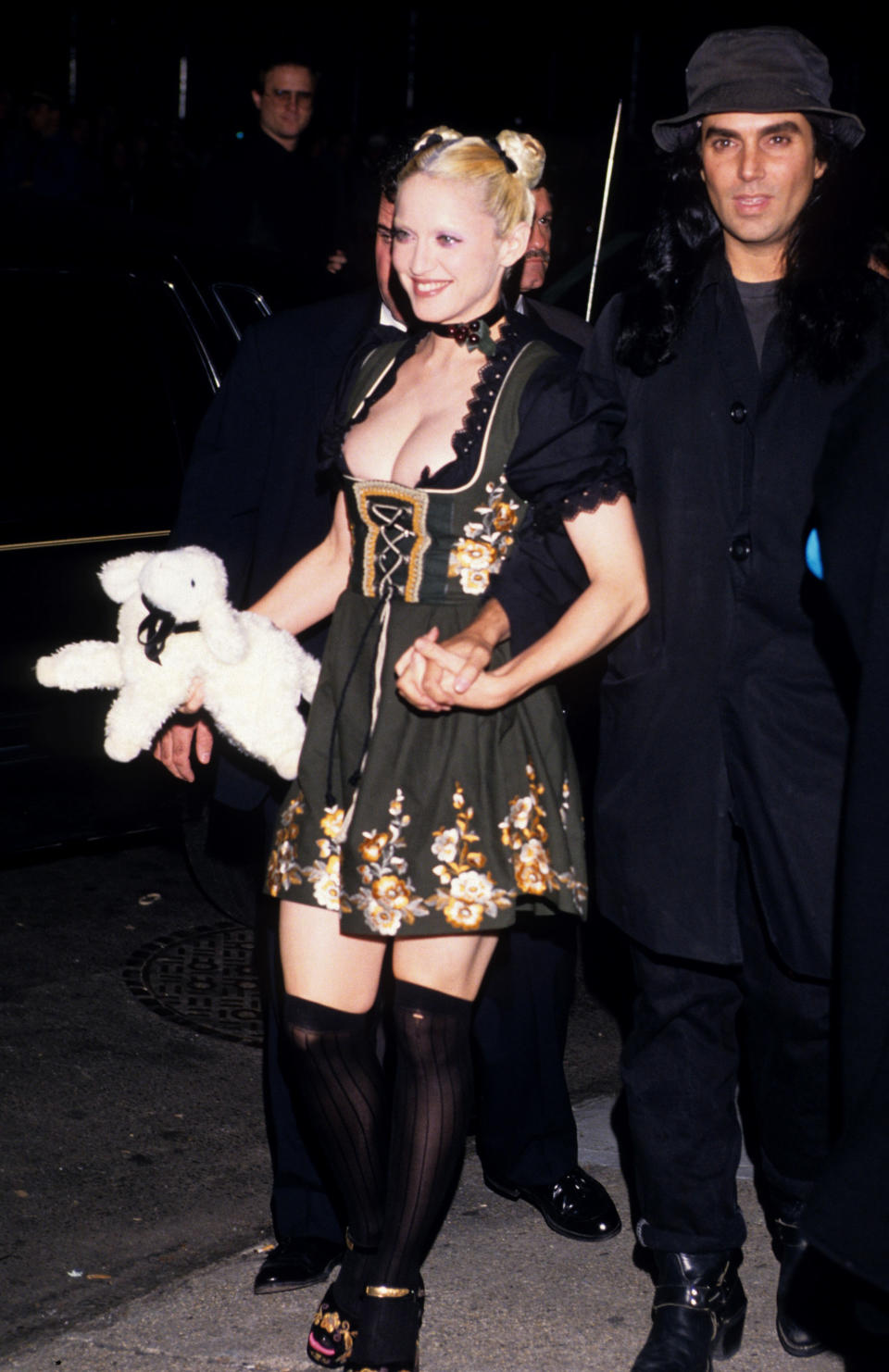 To celebrate her NSFW book <i>Sex</i><i>,</i> Madonna (here with its photographer, Steven Meisel) opted for a <a href="https://en.wikipedia.org/wiki/Dirndl" target="_blank" rel="noopener noreferrer">dirndl</a>, which she paired with a stuffed animal. (Also note her bleached eyebrows.)