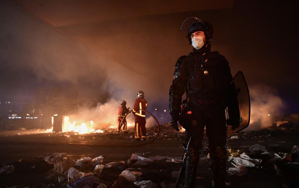 French police forcibly evacuated migrants from a makeshift camp in the northern Paris suburb of Saint Denis in November 2020