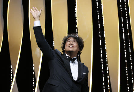 72nd Cannes Film Festival - Closing ceremony - Cannes, France, May 25, 2019. Director Bong Joon-ho, Palme d'Or award winner for his film "Parasite" (Gisaengchung), reacts. REUTERS/Stephane Mahe