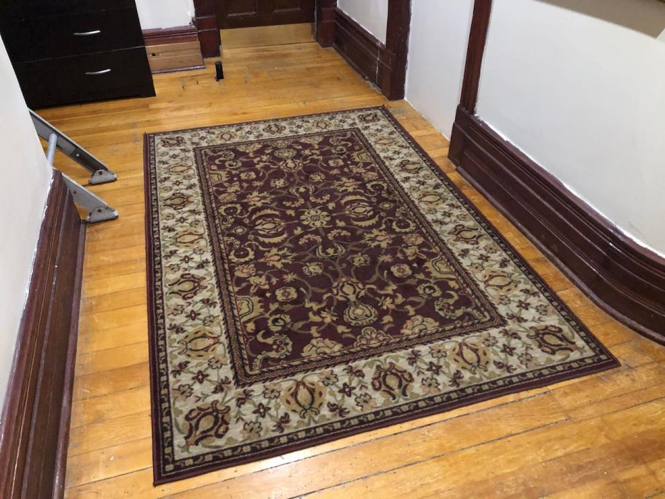 An original mat seen on the original wood flooring of The Manor's top floor. 