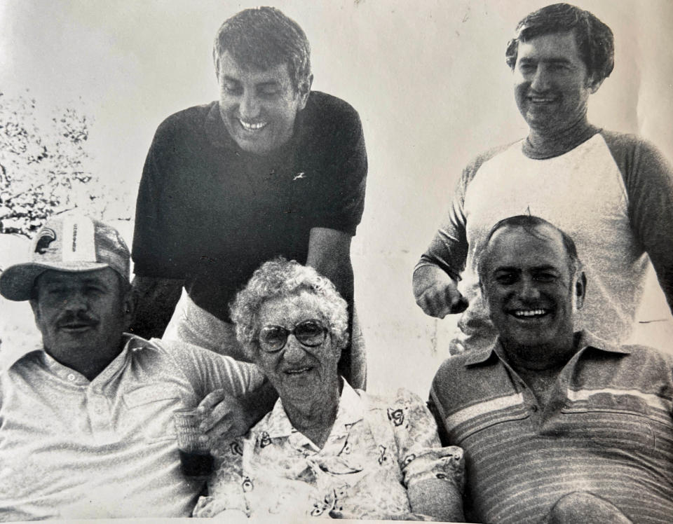 Garrey Carruthers, back left, is pictured with his mother, Frankie, and his three brothers — Bill, Jim and Michael — are pictured in this undated photo.