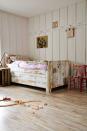 <p>The modern rustic trend has been around for a few years now and shows no sign of abating. As seen here, it works really well for a girls' bedroom idea. It's all about creating a characterful feel – the panelling on the walls, reclaimed wood-style bed, and the upturned crate used as a bedside table. Add in vintage finds like old paintings and kids' chairs from car boot sales. A lick of paint will work wonders and will add colour to the scheme.</p><p>Pictured: Amtico lime washed wood flooring with Ellipse and Square borders and corners, <a href="https://www.amtico.com/flooring/products/product-search/AR0W7660/" rel="nofollow noopener" target="_blank" data-ylk="slk:Amtico;elm:context_link;itc:0;sec:content-canvas" class="link ">Amtico</a></p>