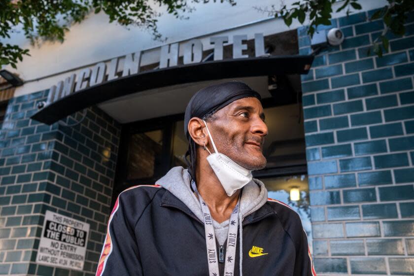 Los Angeles, CA - September 27: Portrait of Marvin Danzey, III, 58, outside the Lincoln Hotel on Wednesday, Sept. 27, 2023, in Los Angeles, CA. Marvin Danzey is a former tenant of the Dewey Hotel. Danzey has significant mobility issues. He left his dentures and most of the rest of his belongings at the Dewey. He was not allowed to go back into the Dewey to pick up his belongings. He was transferred to the Lincoln from the Vagabond less than a month ago. (Francine Orr / Los Angeles Times)