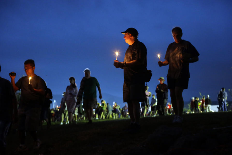 Members of the public take part in a candle light procession to Soldiers' National Cemetery during ongoing activities commemorating the 150th anniversary of the Battle of Gettysburg, Sunday, June 30, 2013, in Gettysburg, Pa. Union forces turned away a Confederate advance in the pivotal battle of the Civil War fought July 1-3, 1863, which was also the war’s bloodiest conflict with more than 51,000 casualties. (AP Photo/Matt Rourke)