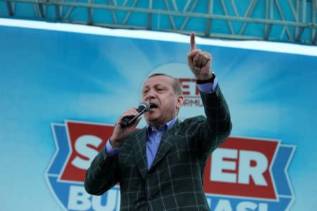 Turkish President Tayyip Erdogan addresses his supporters during a rally for the upcoming referendum in Istanbul, Turkey, April 15, 2017. REUTERS/Alkis Konstantinidis