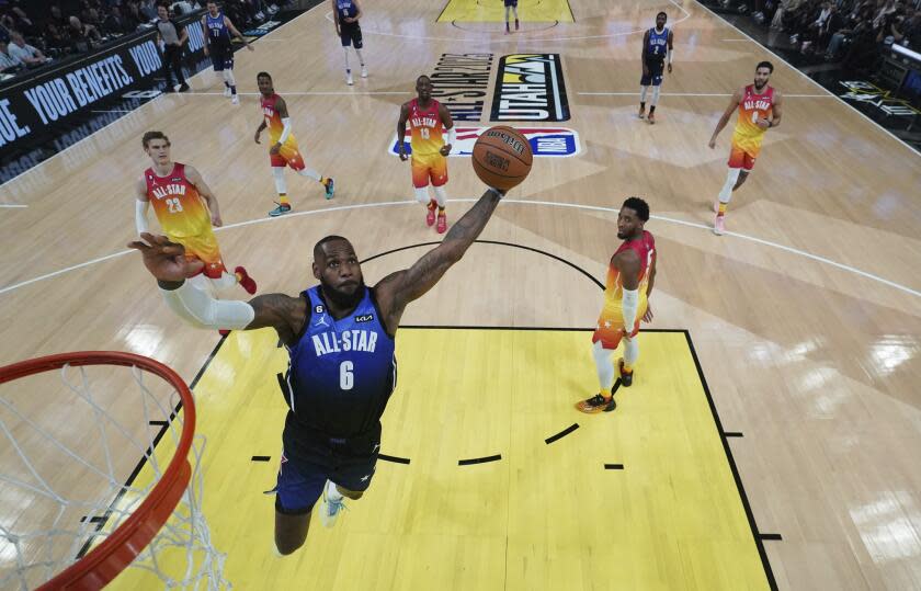 Team LeBron forward LeBron James (6) dunksduring the first half of the NBA basketball All-Star game Sunday, Feb. 19, 2023, in Salt Lake City. (AP Photo/Kyle Terada/Pool Photo via AP)