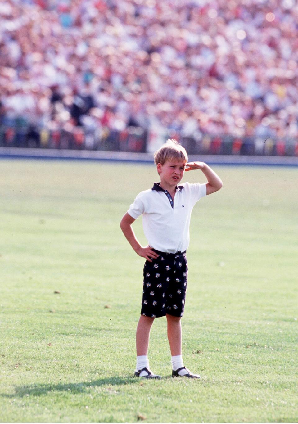 WINDSOR, ENGLAND - JULY 31:  A young Prince William stands in the middle of Windsor polo ground in July 1986 in Windsor, England. (Photo by Anwar Hussein/Getty Images)