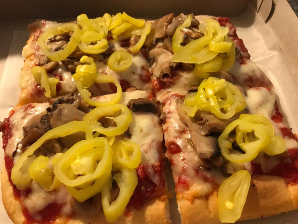 The mushrooms and banana pepper pizza at Buzzi's,