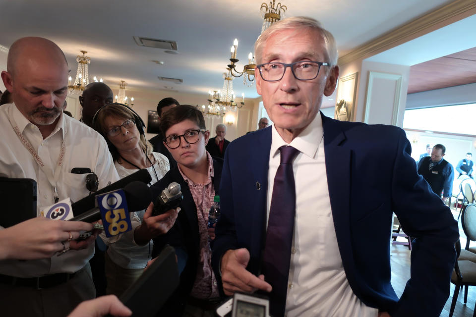 FILE - In this Sept. 24, 2019, file photo, Wisconsin Gov. Tony Evers speaks with reporters at an event in Madison, Wis. Wisconsin's Republican-controlled state Senate is preparing to take the extraordinary step of removing the state's agriculture secretary who was appointed by the Democratic governor. It is the latest flash point in a series of ongoing tensions that began even before the governor took office in January. (AP Photo/Scott Bauer File)