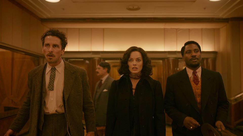 Christian Bale, Margot Robbie, and John David Washington in 20th Century Studios' AMSTERDAM.