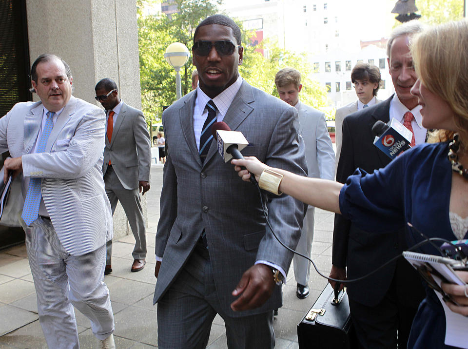 Suspended New Orleans Saints linebacker Jonathan Vilma arrives to testify at Federal Court in New Orleans, Thursday, July 26, 2012. Vilma is seeking a temporary restraining order that would allow him to return to work while his lawsuit against NFL Commissioner Roger Goodell is pending. Goodell suspended Vilma for the entire season for what the NFL has said was his leading role in a player-funded bounty program that paid cash bonuses to Saints defensive players for hits that injured opponents. (AP Photo/Gerald Herbert)