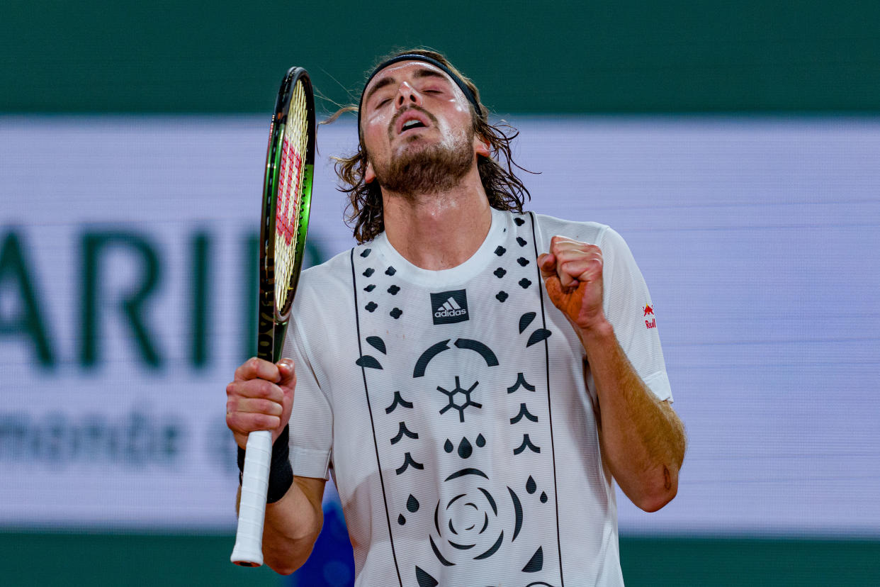 PARIS, FRANCE - MAY 24: Stefanos Tsitsipas of Greece reacts against Lorenzo Musetti of Italy during the Men's Singles First Round match on Day 3 of the French Open at Roland Garros on May 24, 2022 in Paris, France (Photo by Andy Cheung/Getty Images)