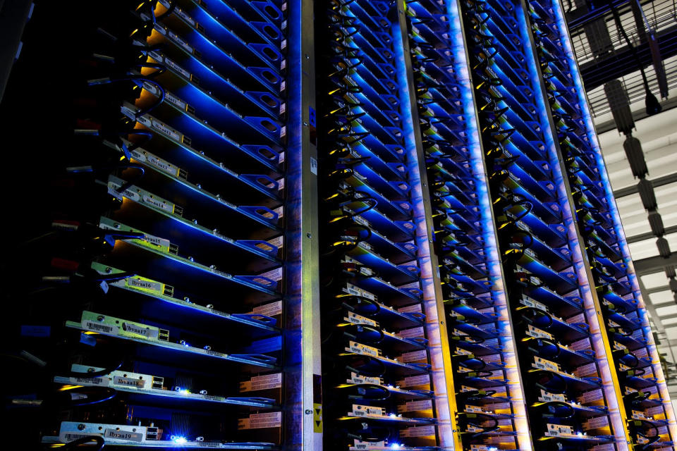 This undated photo provided by Google shows a Google data center in Council Bluffs, Iowa. Google is opening a virtual window into the secretive data centers that serve as its nerve center. The unprecedented peek is being provided through a new website unveiled Wednesday, Oct. 17, 2012. The site features photos from inside some of the eight data centers that Google Inc. already has running in the U.S., Finland and Belgium. (AP Photo/Google, Connie Zhou)