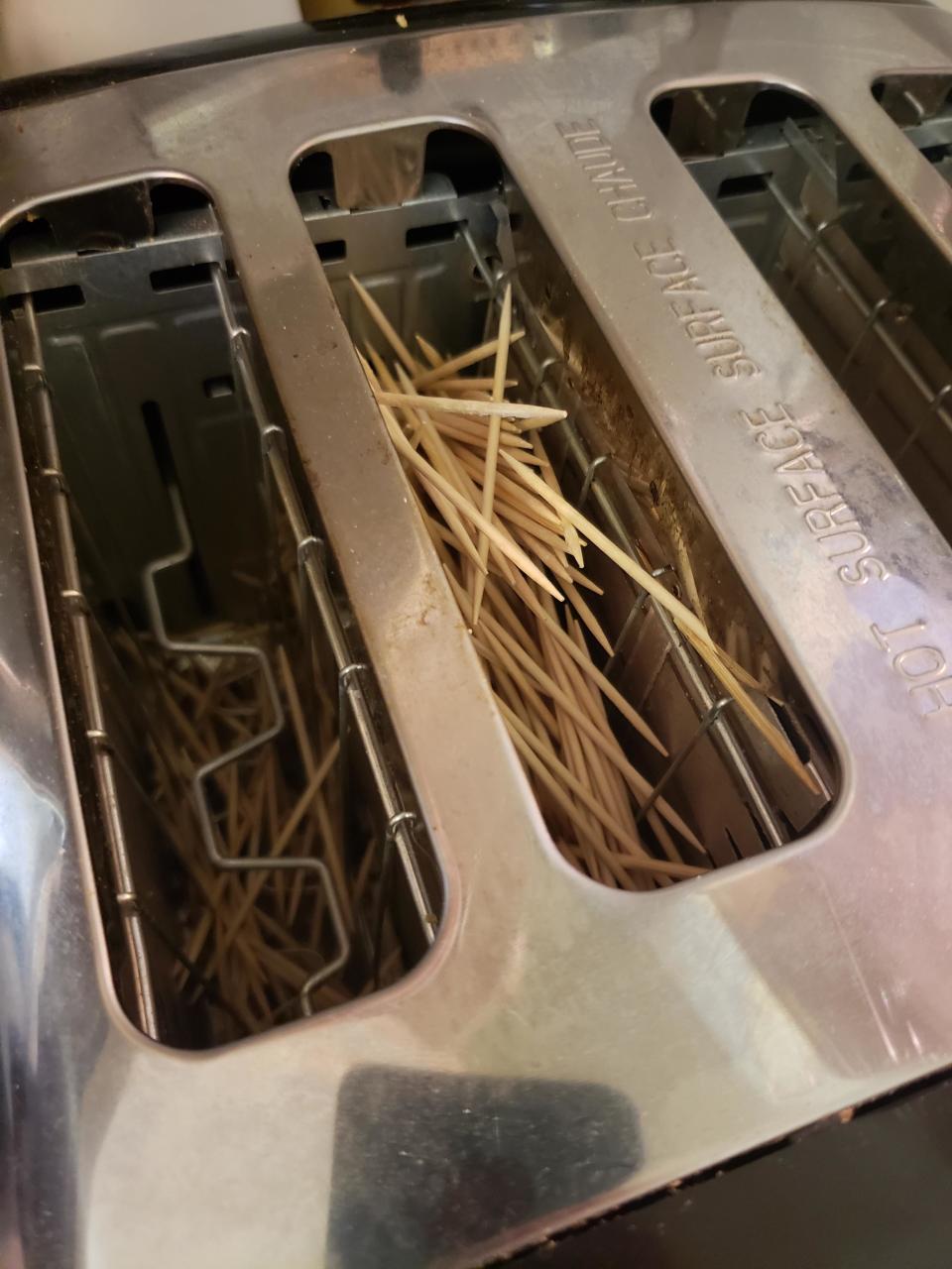 Toaster filled with toothpicks instead of bread