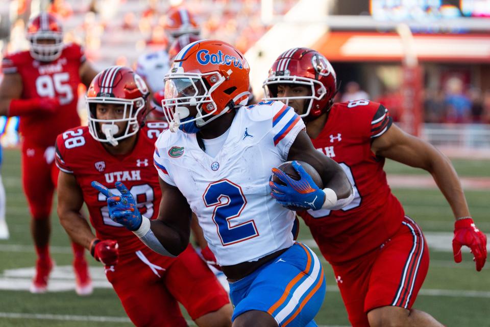 Florida Gators running back Montrell Johnson Jr. (2) runs the ball against Utah during Utah’s season opener at Rice-Eccles Stadium in Salt Lake City on Thursday, Aug. 31, 2023. | Megan Nielsen, Deseret News