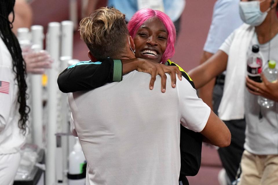 Shaunae Miller-Uibo, of Bahamas embraces her husband Maicel Uibo