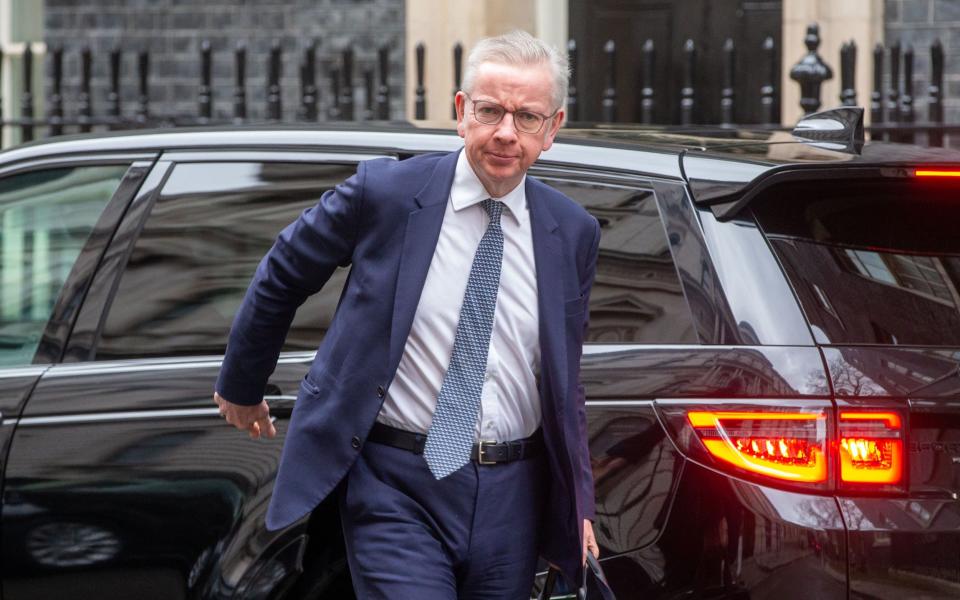 Michael Gove, the Levelling Up Secretary, is pictured this morning in Downing Street