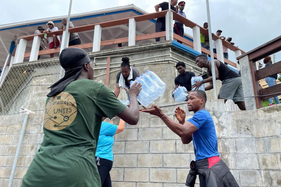 Essential supplies are being loaded onto a vessel at Grenada Yacht Club, destined for the island of Carriacou which was hit hard by Hurricane Beryl, in St. George’s, Grenada, on July 2, 2024.<span class="copyright">Curlan Chrissey Campbell—Reuters</span>