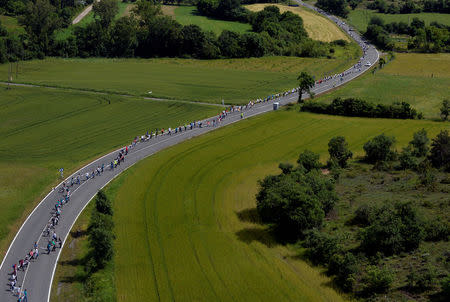 People join hands to form a 202 km (125 miles) long, according to organisers, human chain linking the cities of San Sebastian, Vitoria and Bilbao to call for a right to vote on Basque independence, near Vitoria, Spain, June 10, 2018. REUTERS/Vincent West